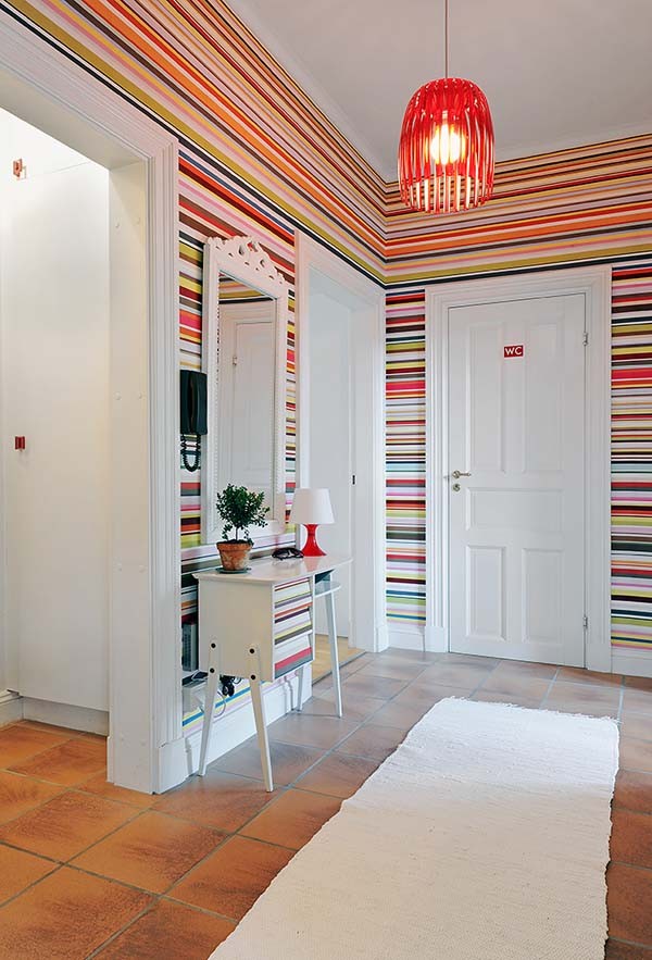 Rainbow stripe wallpaper entryway