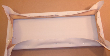 How to Stretch Canvas: A Tutorial with Step-by-step Instructions staples down each side