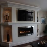 Телевизор над очагом