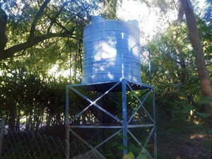 picture of a cistern that resembles a large tank on a stand