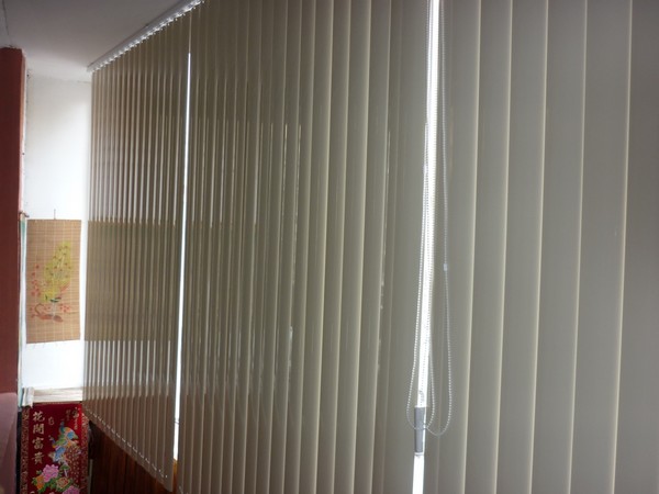 Vertical blinds on the balcony photo